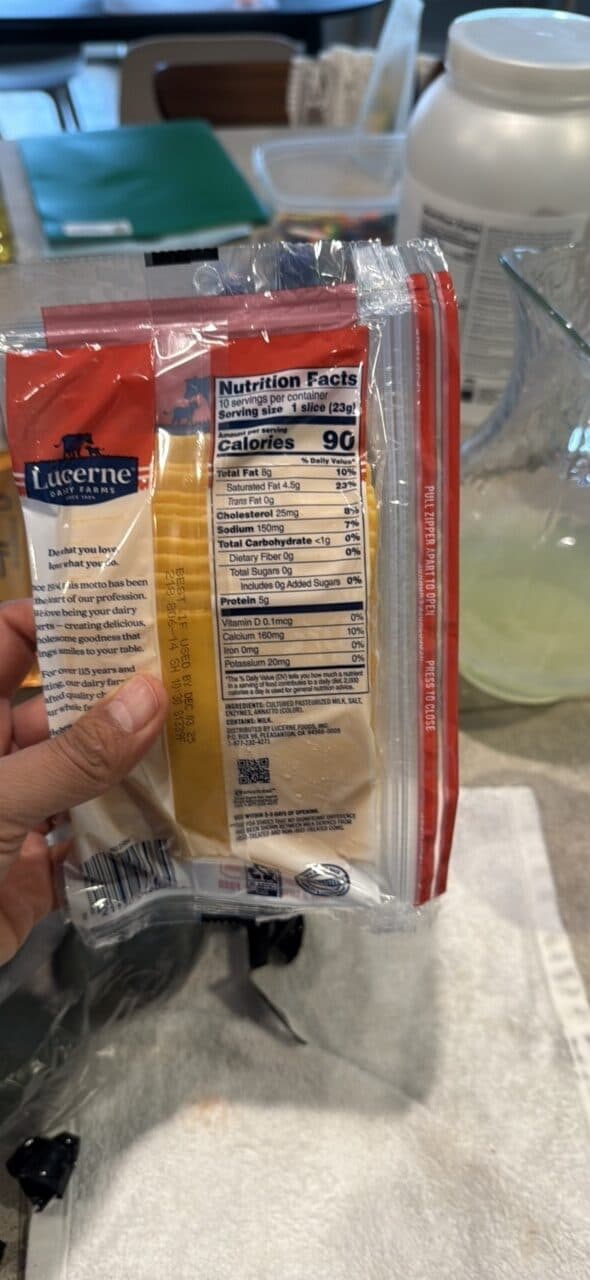 Lucerne Sharp Cheddar Cheese Slices packshot