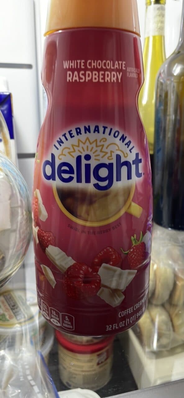INTERNATIONAL delight WHITE CHOCOLATE RASPBERRY COFFEE CREAMER packshot