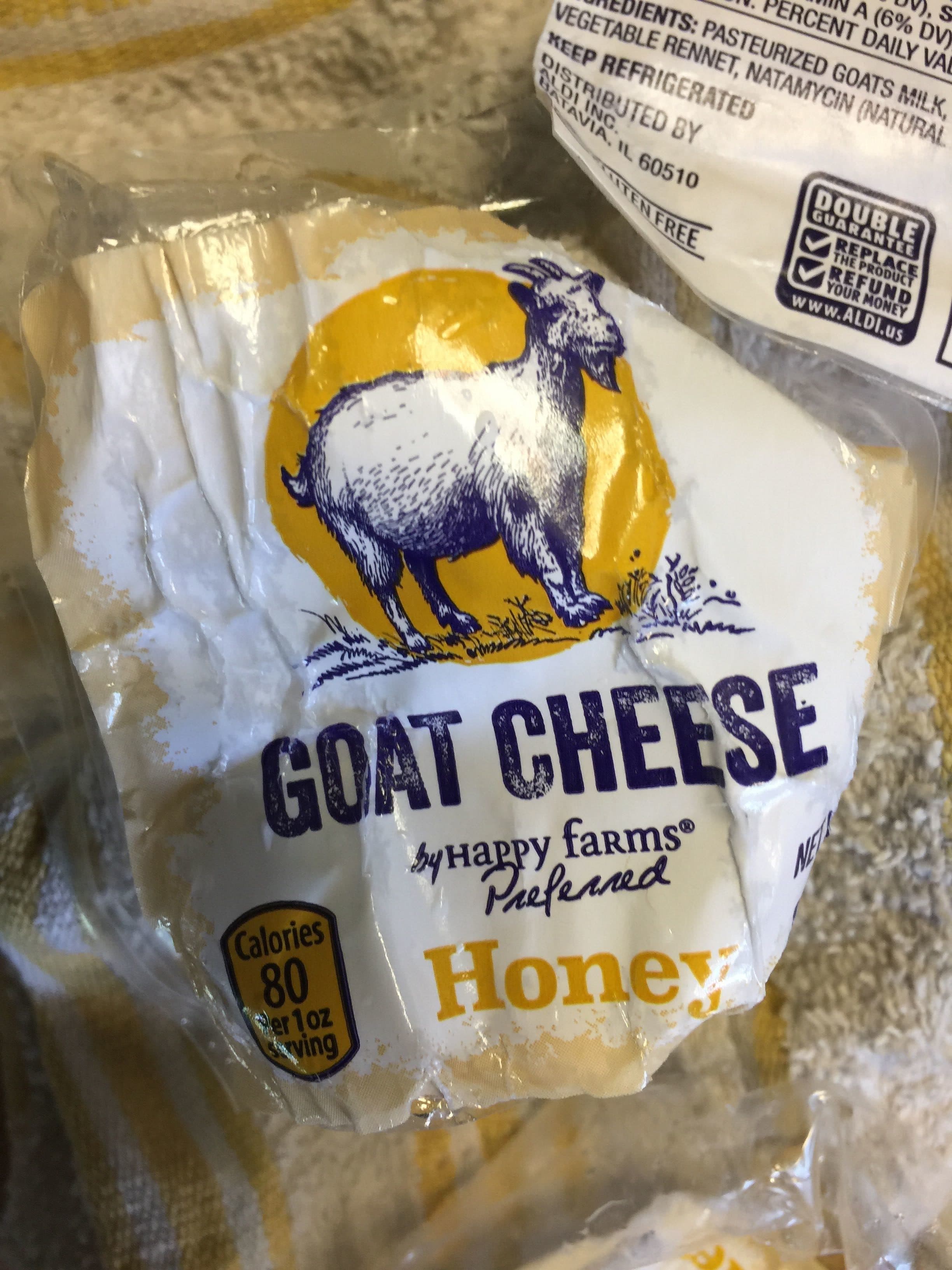 Happy Farm Honey goat cheese, honey packshot