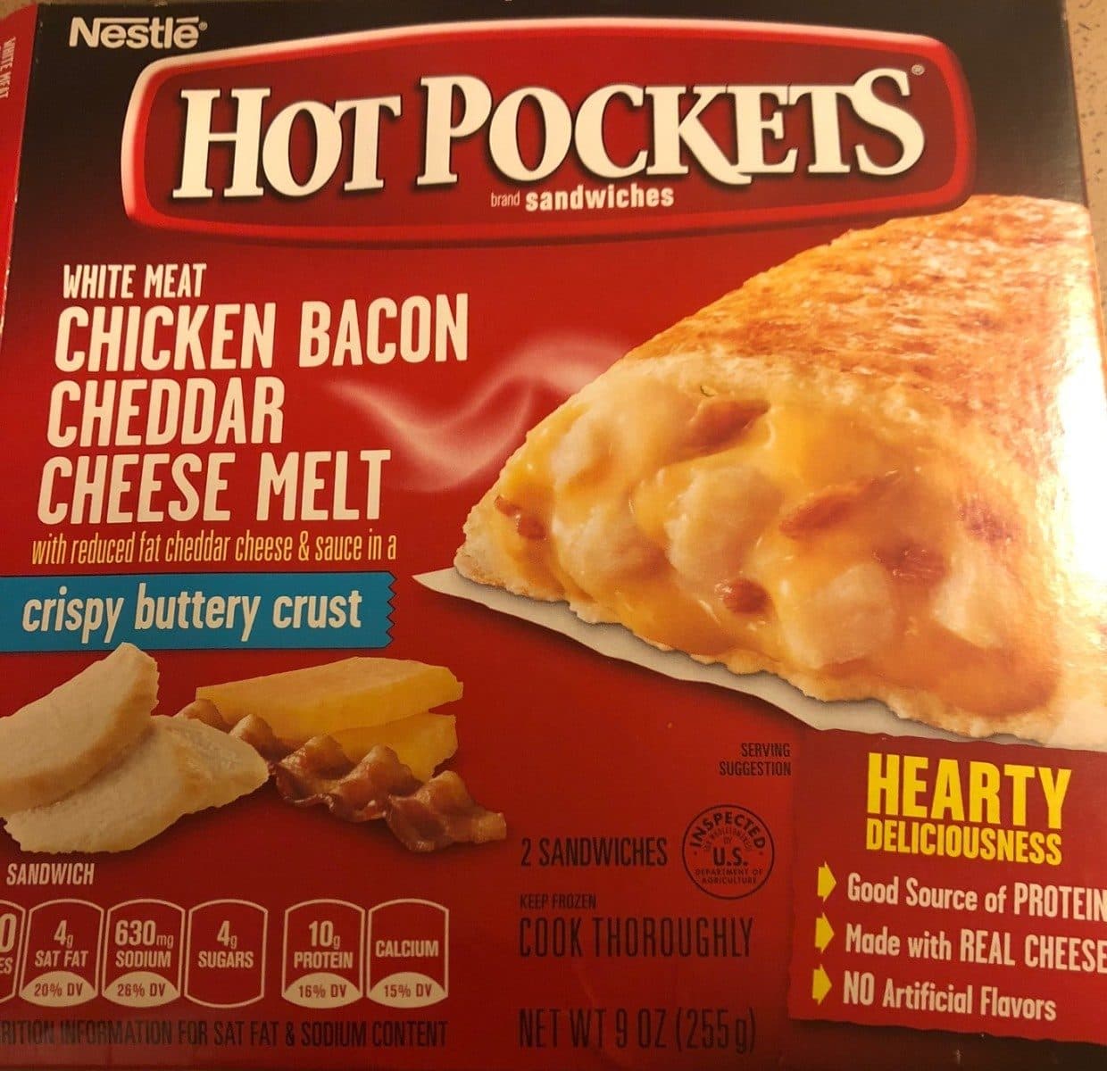 Nestlé White meat chicken bacon cheddar cheese melt with reduced fat cheddar cheese & sauce in a crispy buttery crust sandwiches, white meat chicken bacon cheddar cheese melt packshot