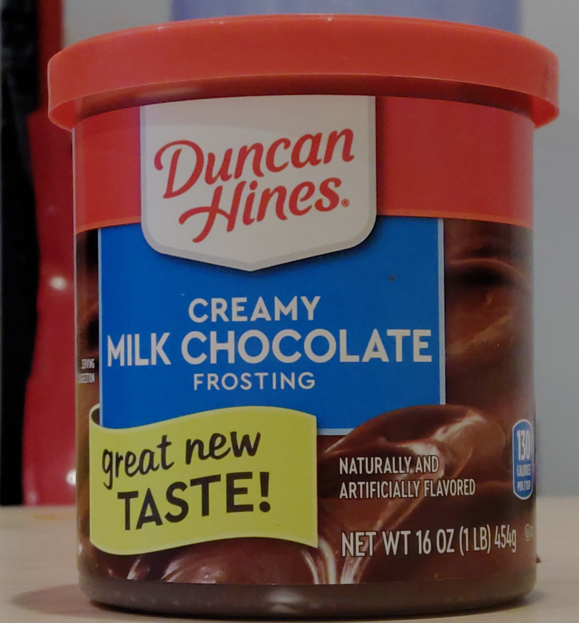 Duncan Hines Duncan hines, creamy home-style frosting, milk chocolate packshot
