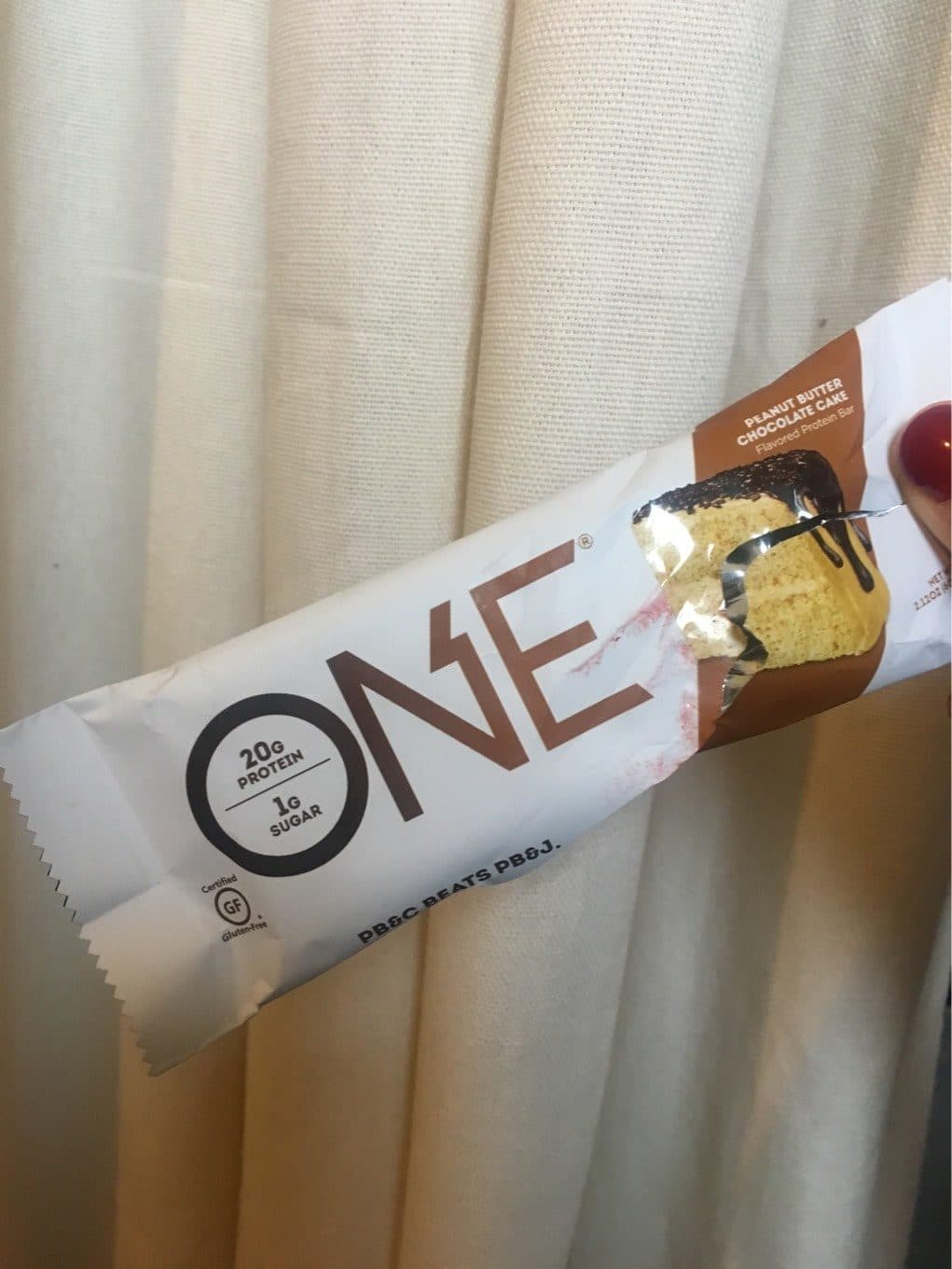 One Peanut butter chocolate cake flavored protein bar, peanut butter chocolate cake packshot