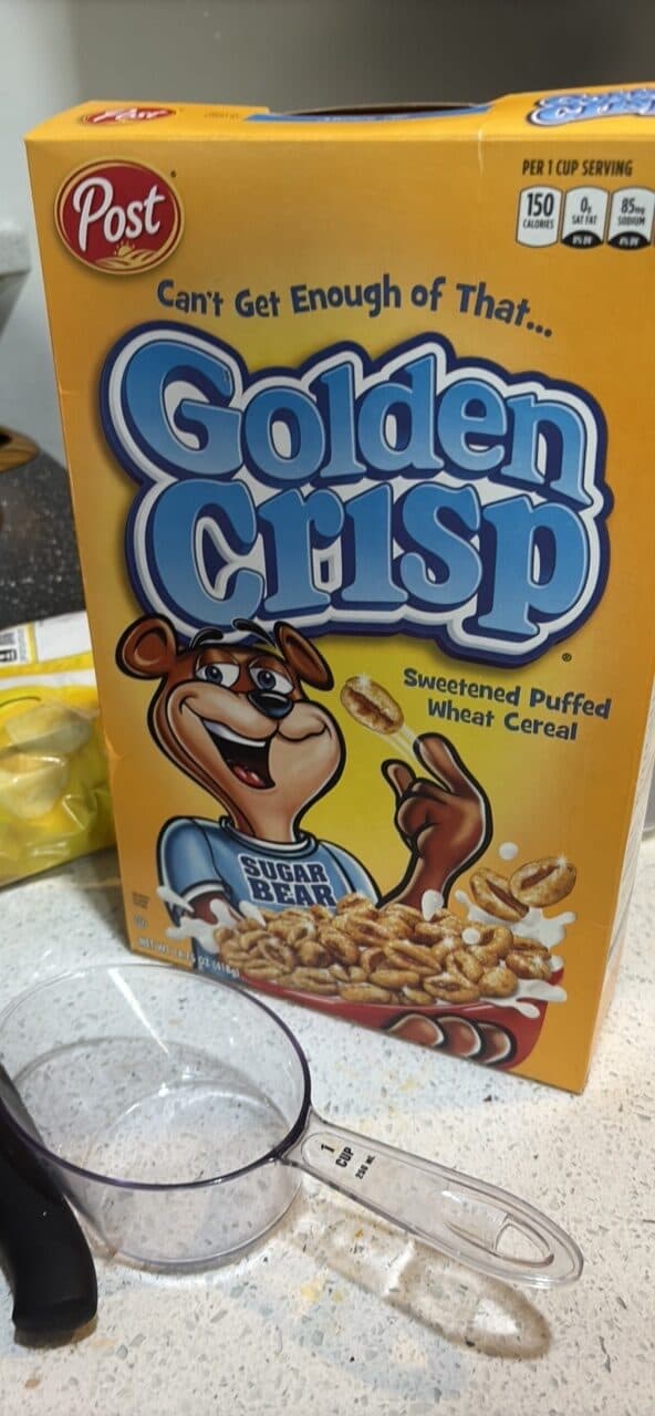 Post Golden Crisp Sweetened Puffed Wheat Cereal packshot