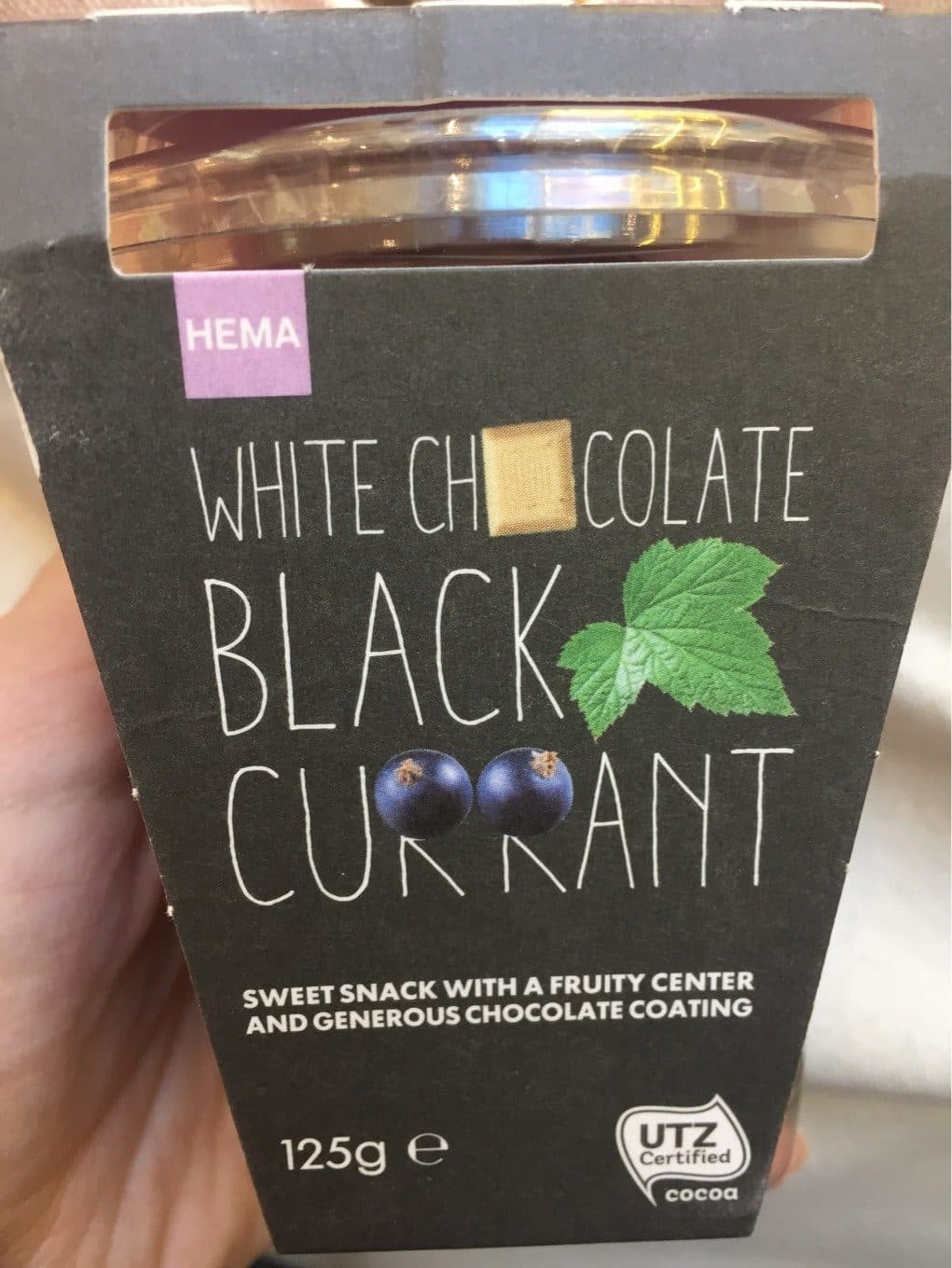 Hema White chocolate Black Currant packshot
