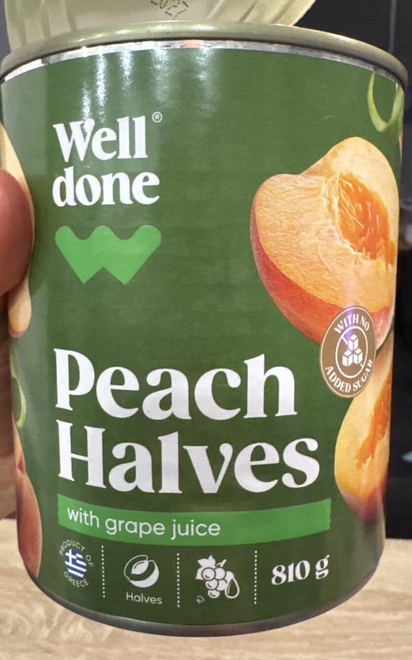 Well done Canned Peach Halves in Grape Juice packshot