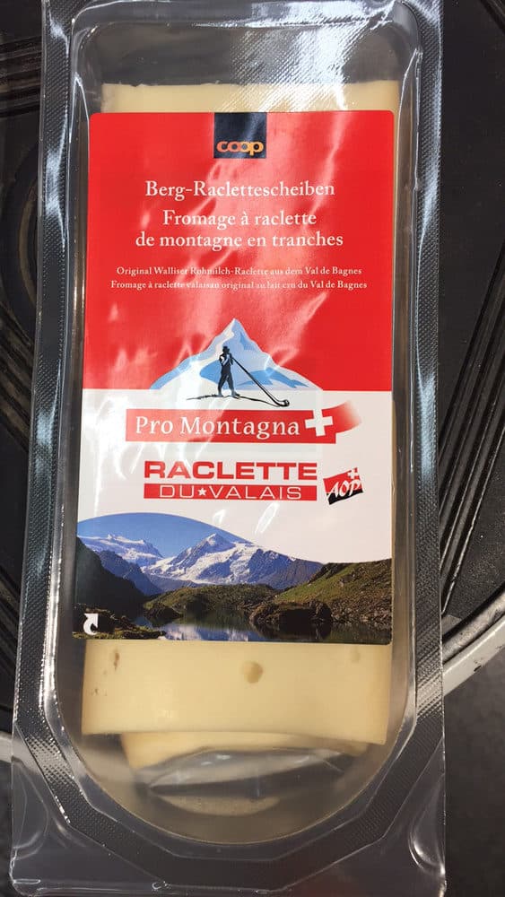 COOP Fromage à raclette de montagne en tranches Pro Montagna packshot