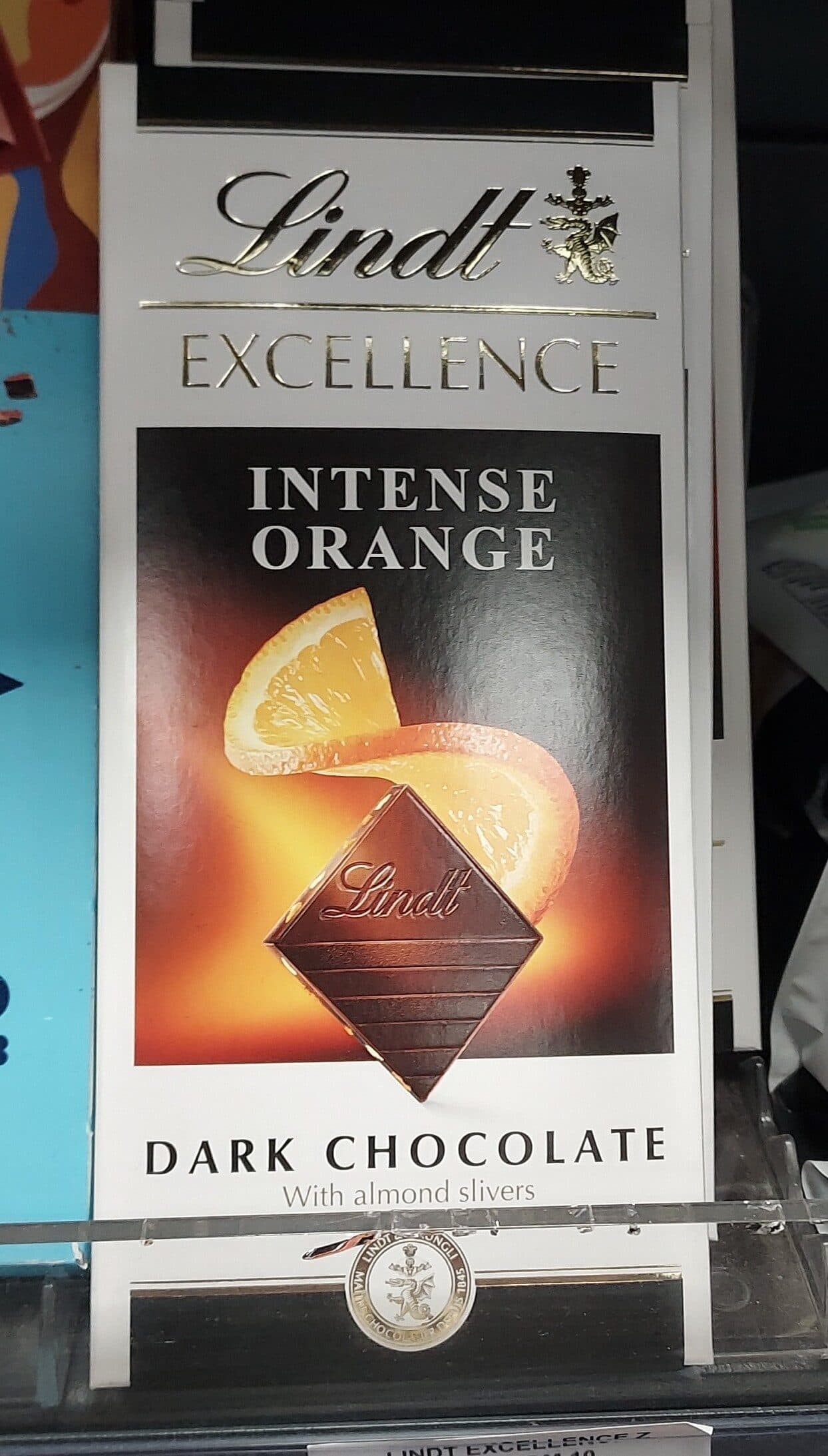 Lindt INTENSE ORANGE DARK CHOCOLATE With almond slivers packshot
