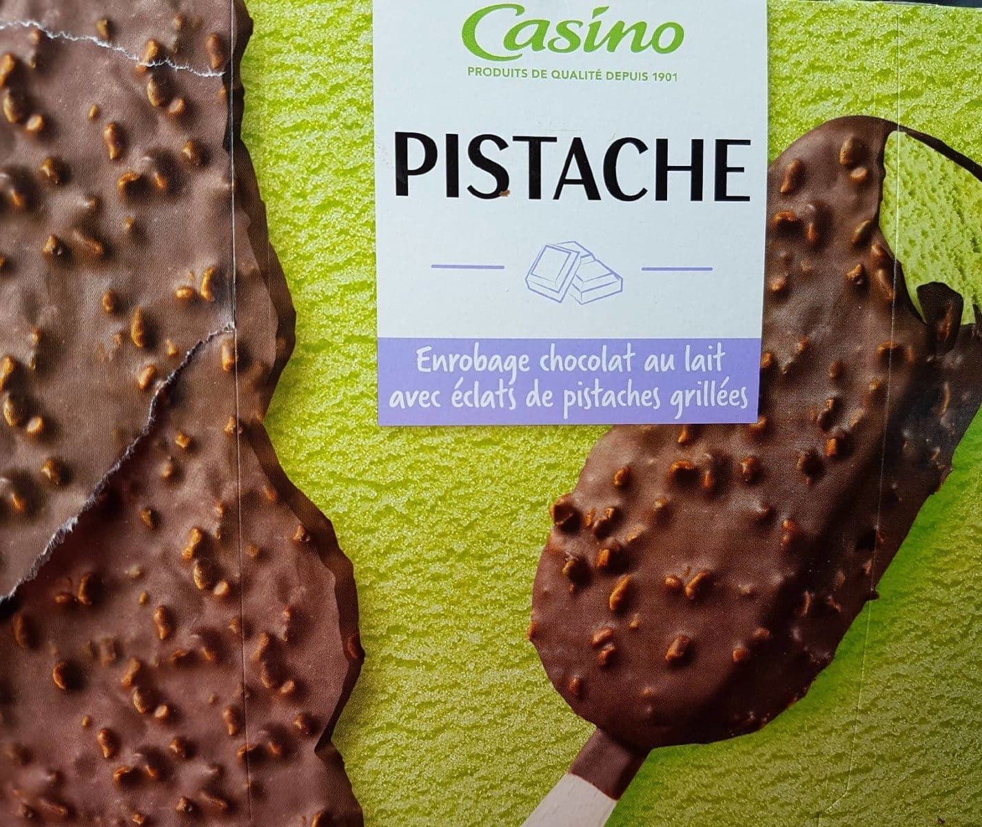 Casino Pistache Enrobage chocolat au lait avec éclats de pistache grillées packshot