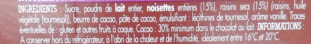 Intermarché Tablette bloc chocolat au lait aux raisins et noisettes entières - 200g packshot