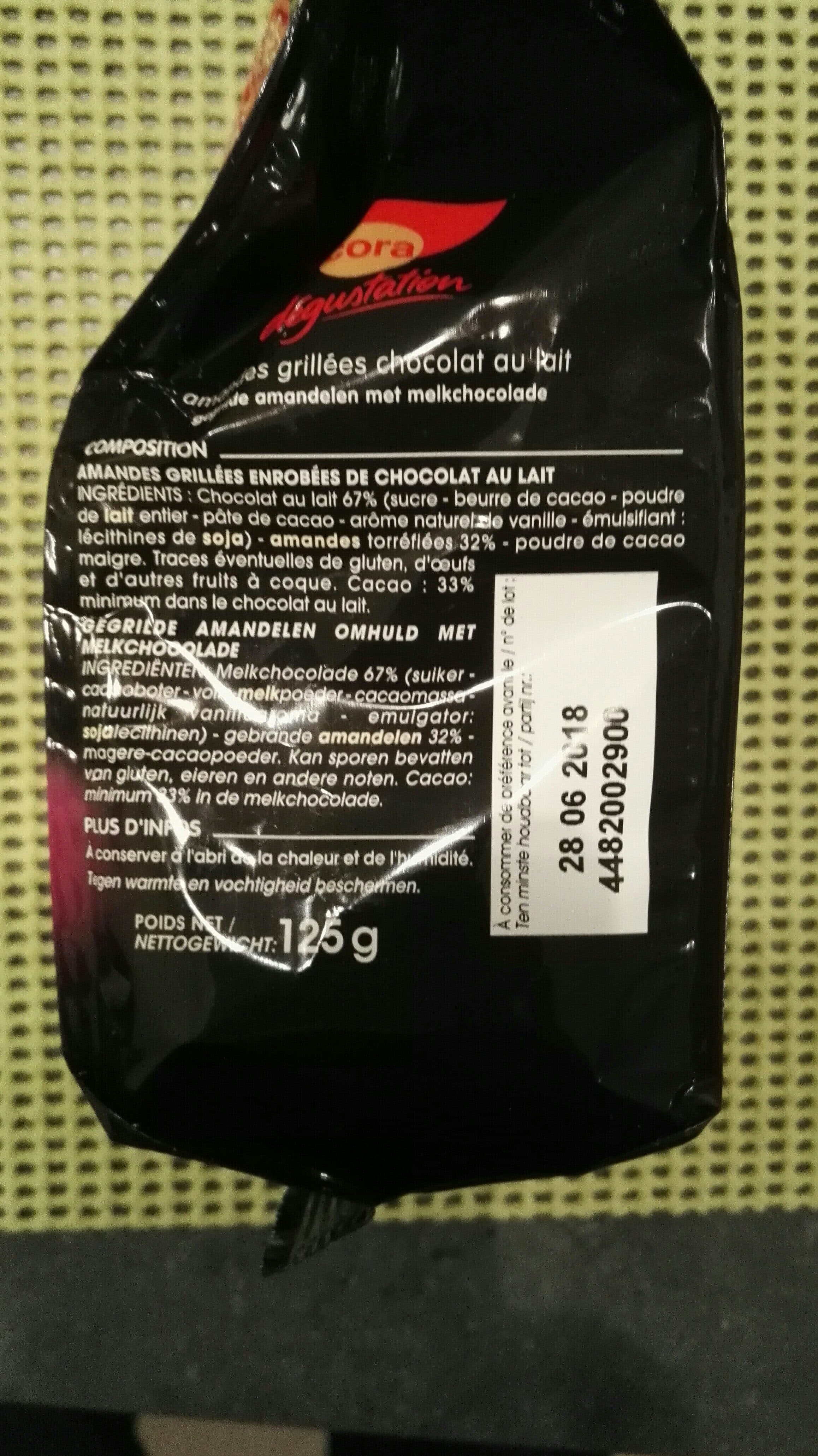 Cora Amandes Grillées Enrobées De Chocolat Au Lait. Sachets Individuels, packshot