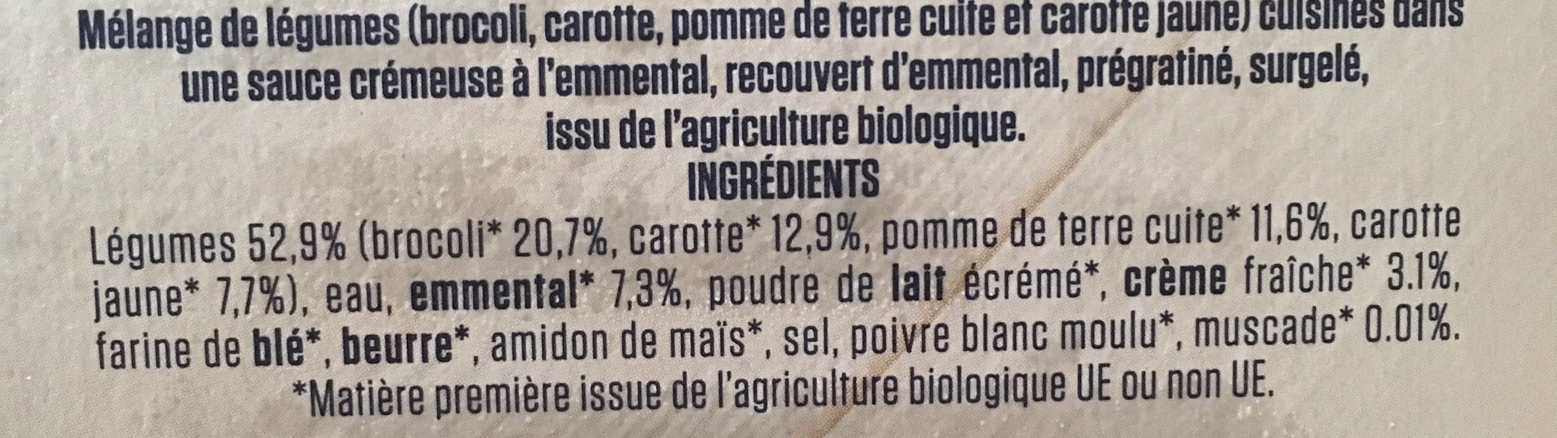 La compagnie artique Mélange de légumes (brocoli, carotte, pomme de terre cuite et carotte jaune) cuisinés dans une sauce crémeuse à l'emmental, recouvert d'emmental, prégratiné, surgelé issu de l'agriculture biologique. packshot