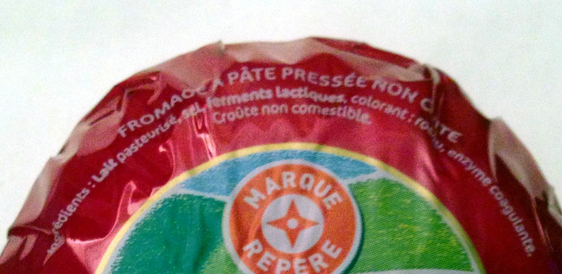 Marque Repère Fromage rond sous cire 28% packshot