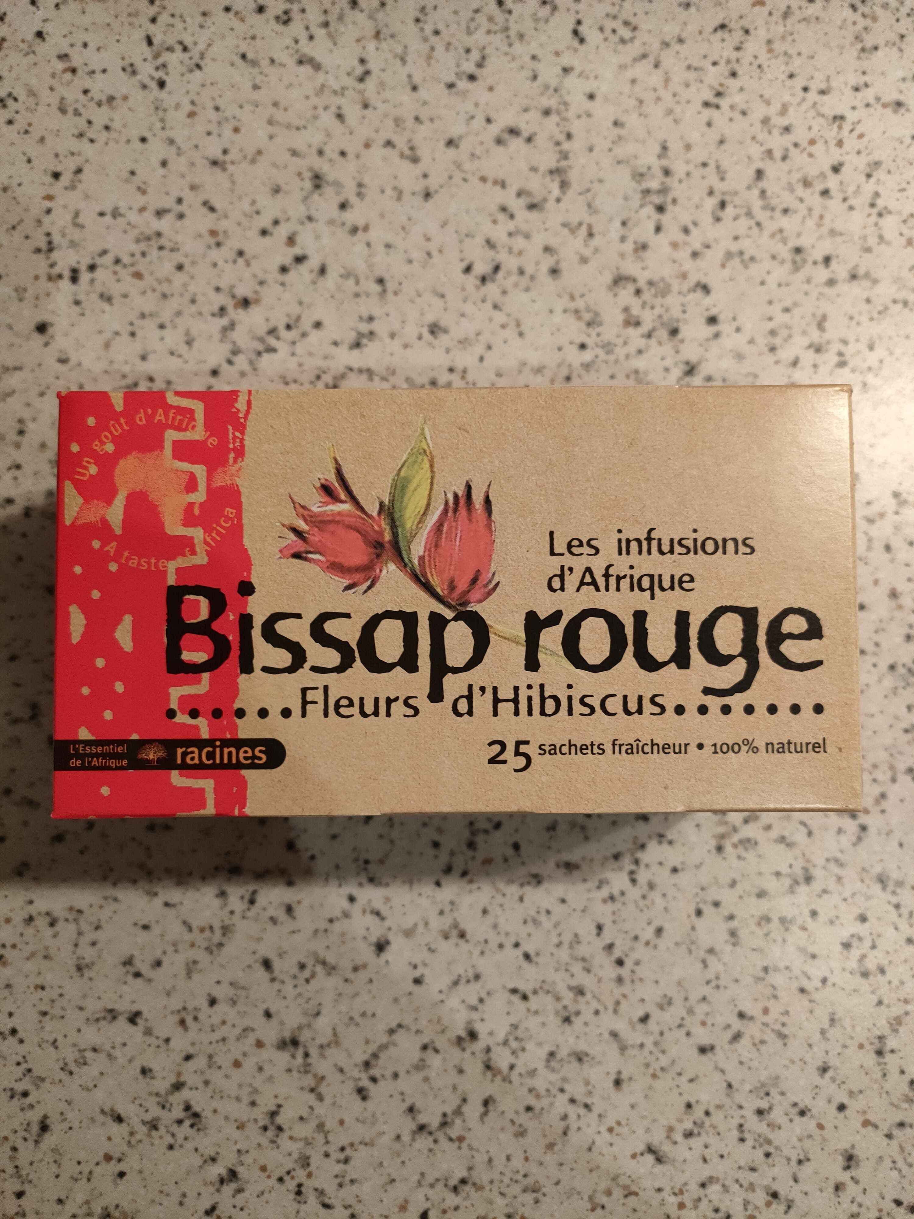 Racines Nissan rouge packshot