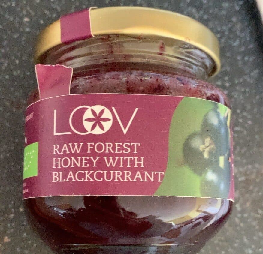 Raw forest honey with blackcurrant packshot