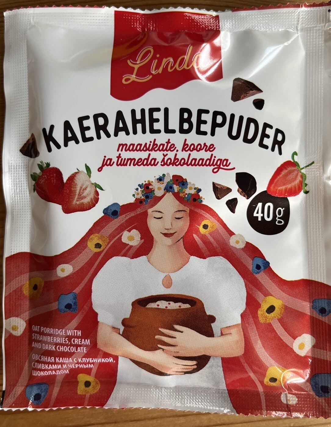 Linda Kaerahelbepuder maasikate koore ja tumeda šokolaadiga packshot