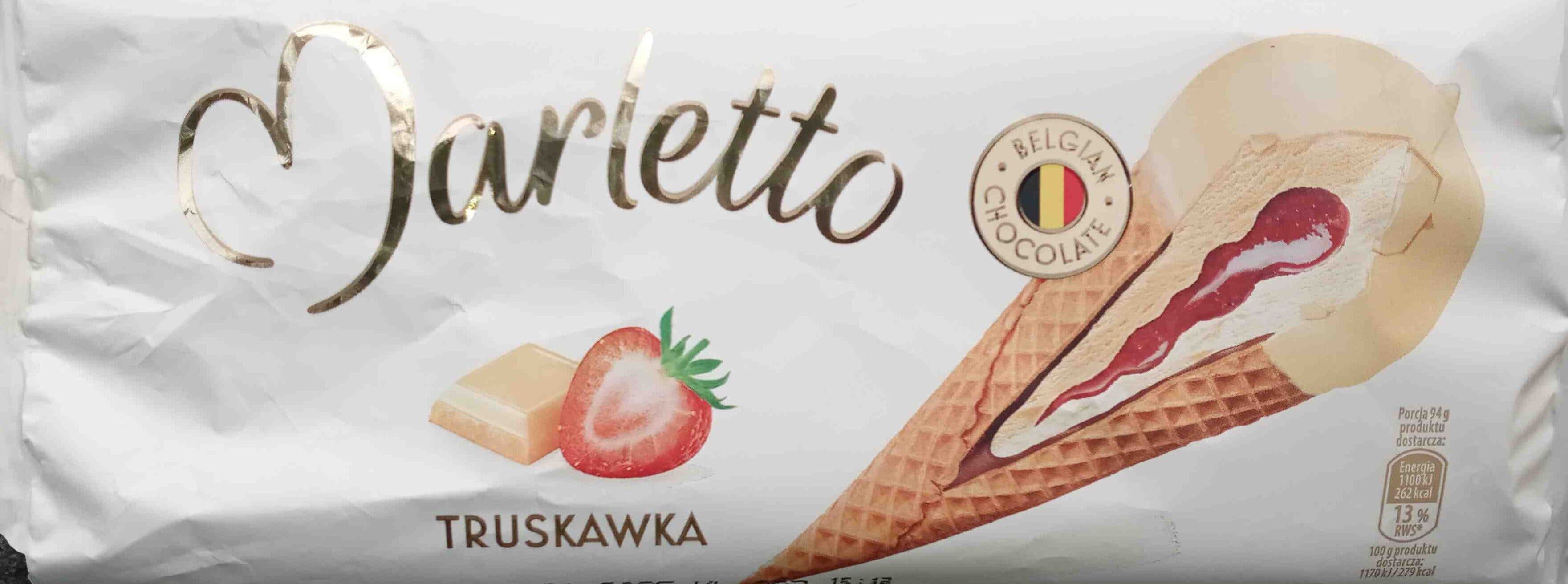 Marletto Lody o smaku waniliowym z nadzieniem truskawkowym, oblane białą belgijską czekoladą, w rożku waflowym packshot
