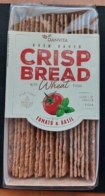 Crisp bread with wheat flour. With tomato and basil. packshot