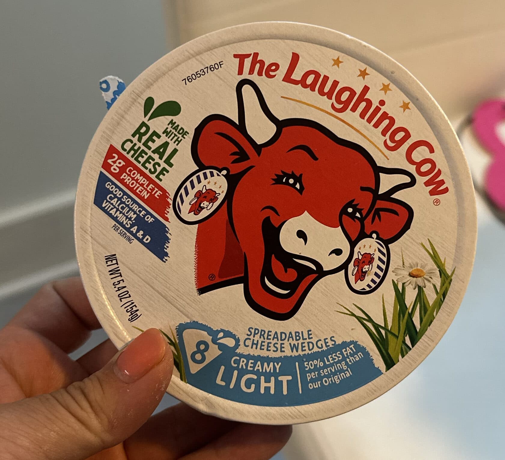 The Laughing Cow Creamy Light Spreadable Cheese Wedges packshot