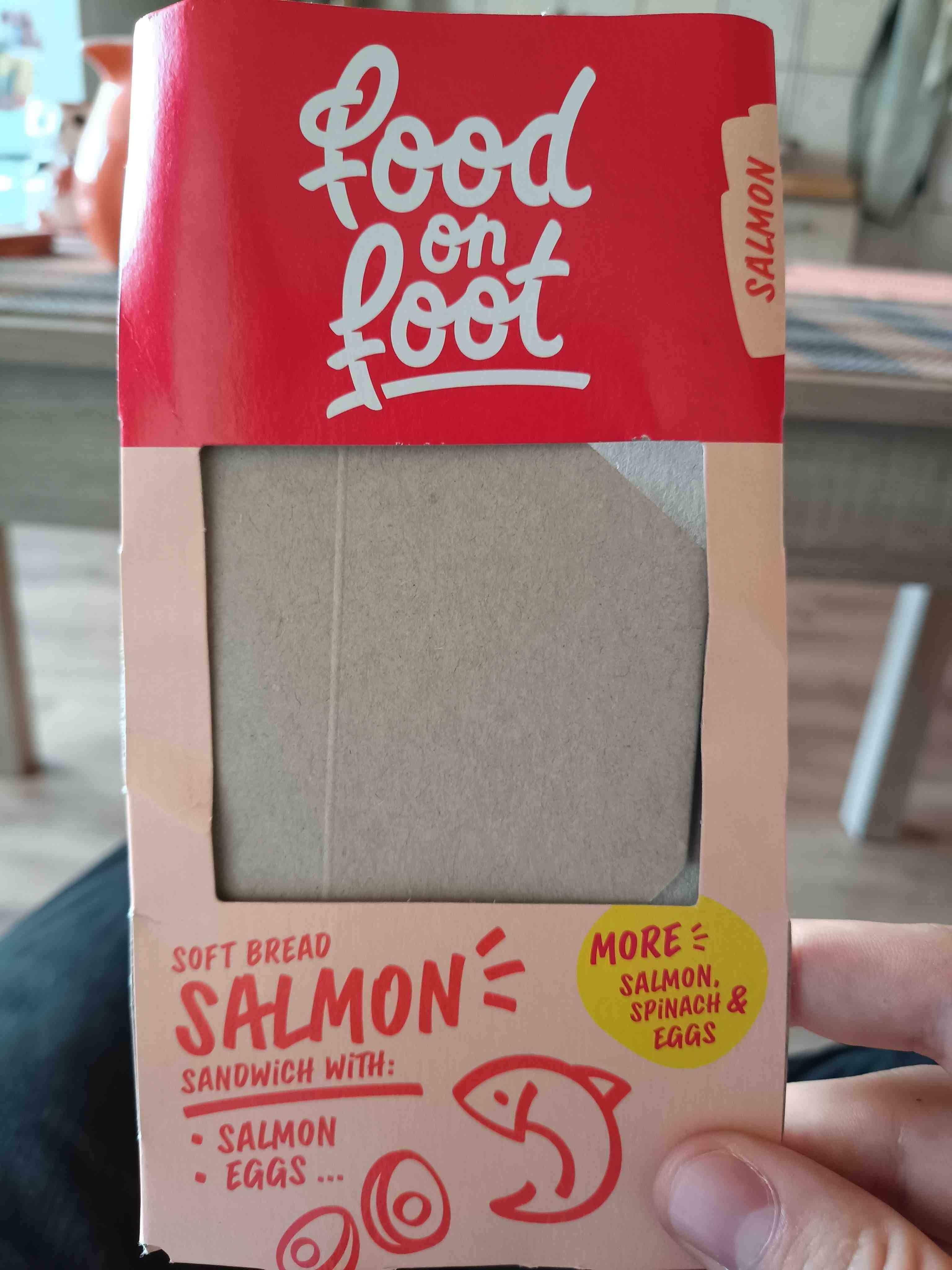 Food on foot Soft bread salmon sandwich packshot