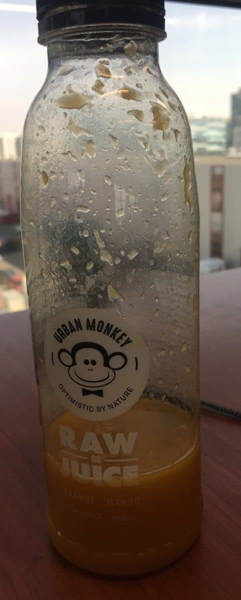 Raw of juce orange mango packshot